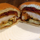 A Popeyes BBQ Bacon Cheddar Chicken Sandwich